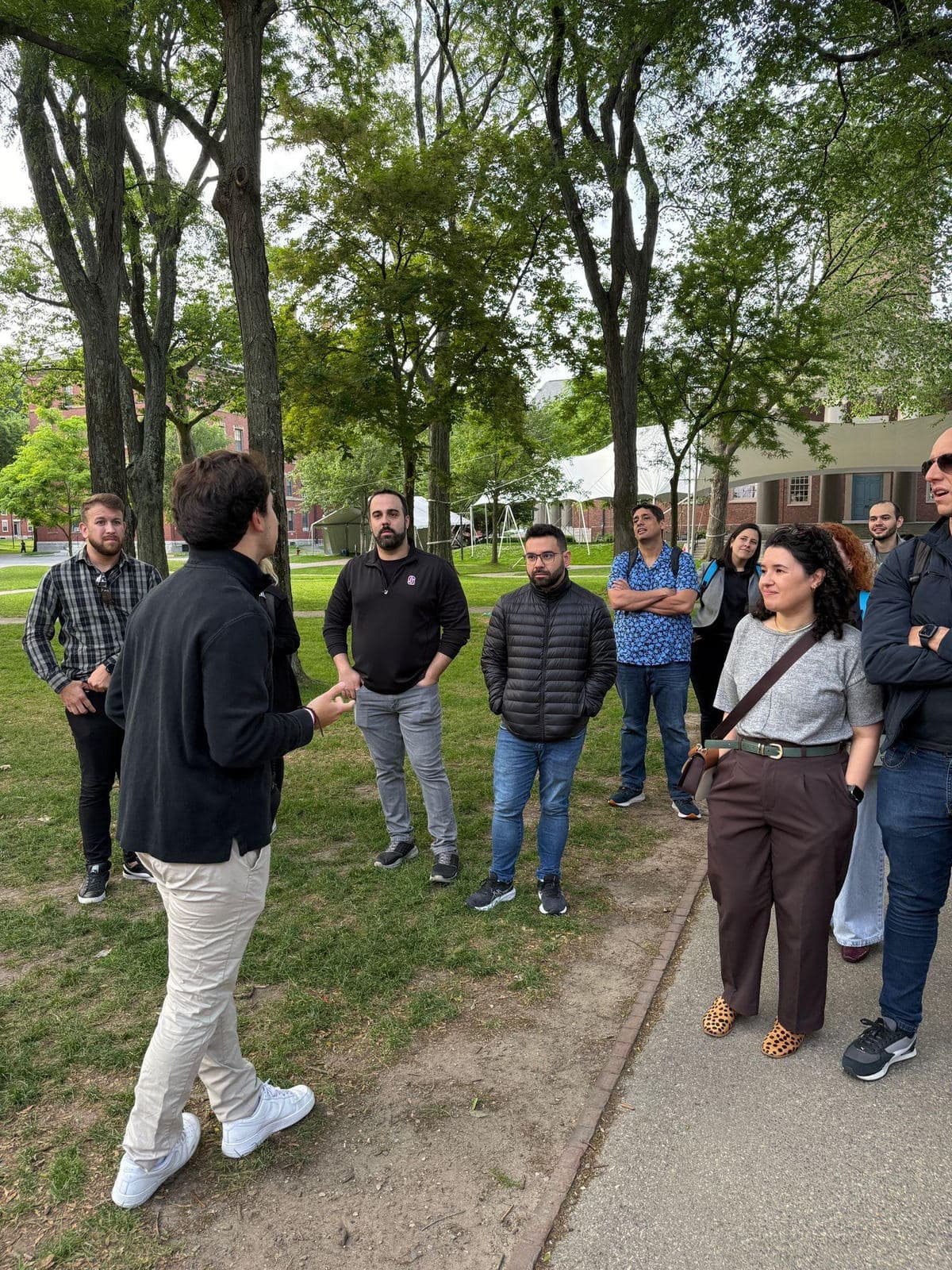 BALSA members gathered outdoors in conversation during a campus visit