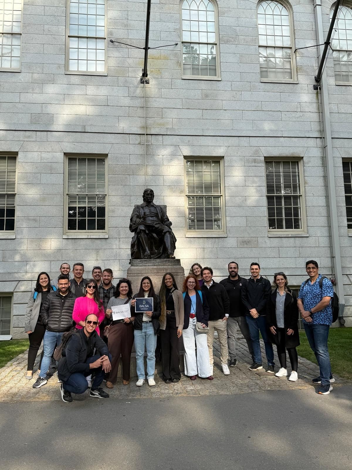 Members with BALSA signs at the John Harvard statue